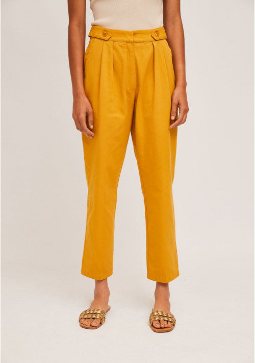 http://www.purrclothing.ca/cdn/shop/products/yellow-ankle-grazer-trousers-with-decorative-belt-loops_1200x1200.jpg?v=1626821518